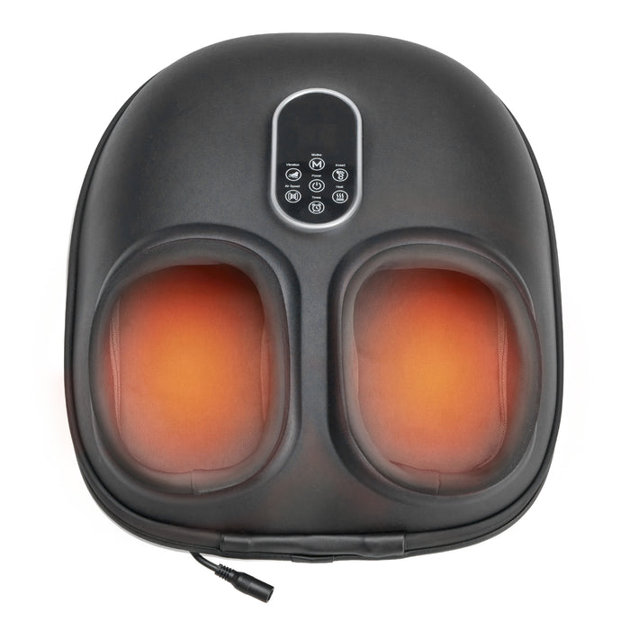 Black electric foot massager top view with heat glow on white background