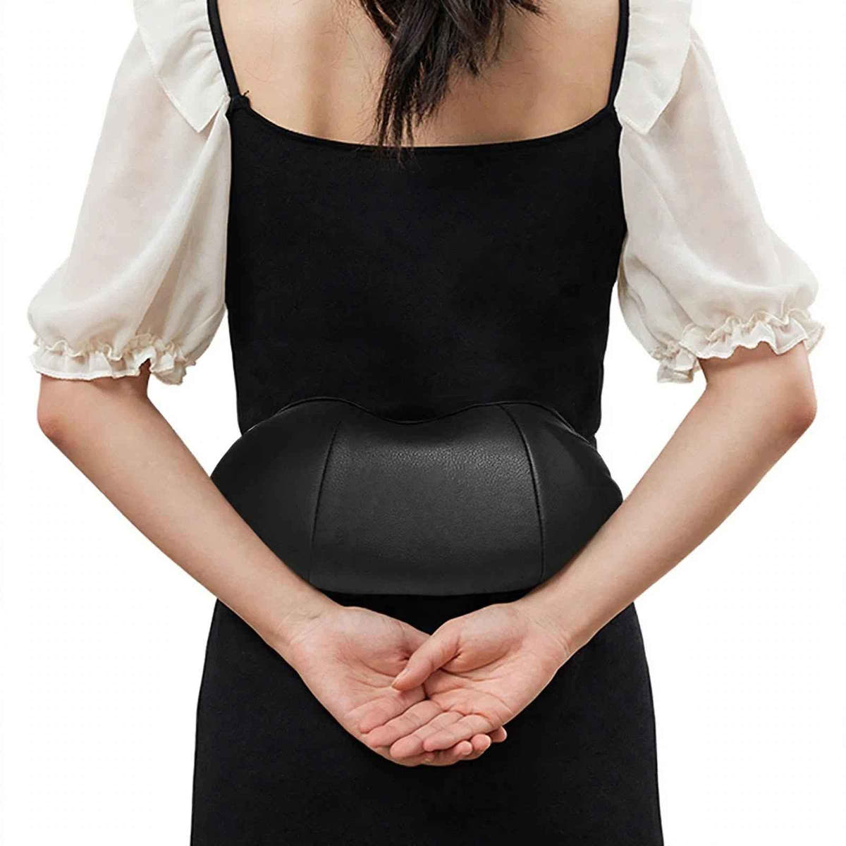 Shiatsu neck and shoulder massager used on the lower back