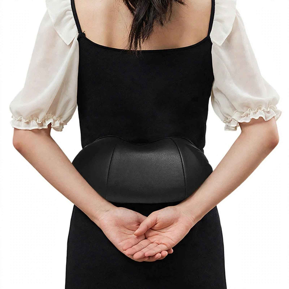 Shiatsu neck and shoulder massager used on the lower back
