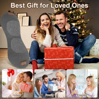 Back massager pillow with a couple opening a gift by a Christmas tree